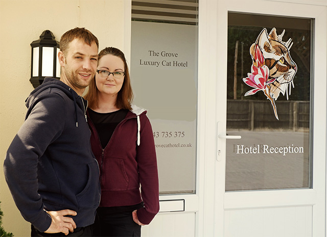 Lynsey and Carl standing outside reception.